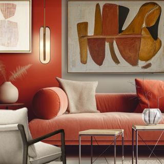 Modern Living Room with Abstract Art and Orange Sofa